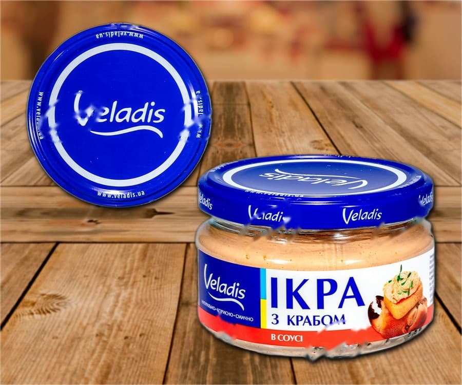 Uova di capelin in salsa cremosa con polpa di granchio marrone